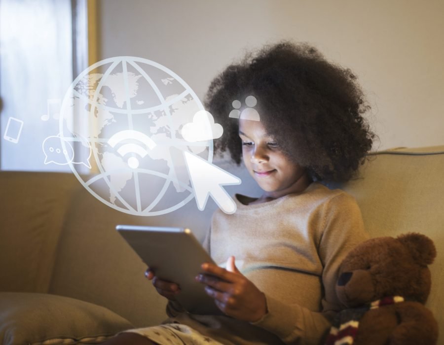Young black girl using a digital tablet