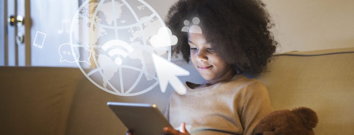 Young black girl using a digital tablet